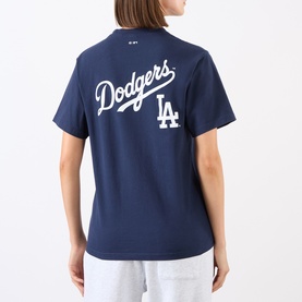 Model wearing Sporty and Rich Dark Navy Dodgers LA graphic cotton T-shirt, shown from the back