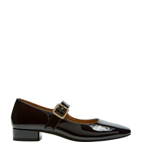 Carl Scarpa black patent leather Mary Jane heels with gold buckle strap and low block heel, side profile view