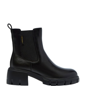 Black leather Chelsea boot with elastic side panel, block heel, and chunky treaded sole