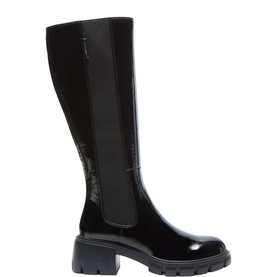 Carl Scarpa knee-high boot in black patent leather with elastic side panel, chunky lug sole, and block heel