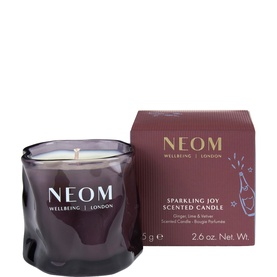 Neom Organics Sparkling Joy Scented Candle in dark plum glass vessel, shown with matching gift box, 75g