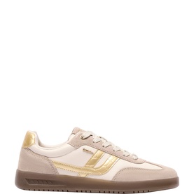Cream and beige low-top trainer with gold metallic side stripe, suede panels, lace-up fastening, and gum rubber sole.
