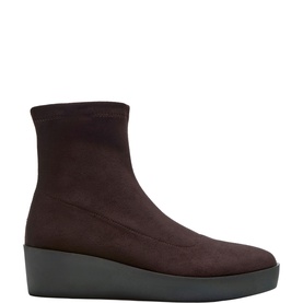 Carl Scarpa brown stretch suede sock ankle boot with square toe and dark wedge sole, side profile view