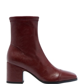 Burgundy leather block heel ankle boot with sock-style fit, square toe cap, and black sole
