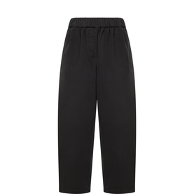 Anne Mi black cotton trousers with elasticated waist, wide cropped leg, flat lay view
