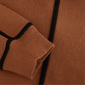 Phase Eight brown knit jumper with black contrast trim detail, showing ribbed cuff and textured fabric close-up