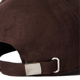 Jigsaw brown linen-texture baseball cap, rear view showing silver metal adjustable clip fastening.