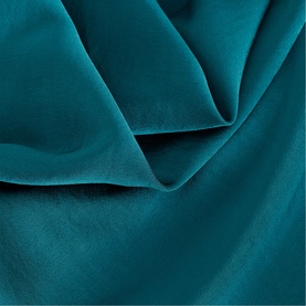 Phase Eight dress in teal blue, close-up of smooth velvet fabric texture showing soft drape and rich colour depth.