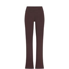 Skims Espresso high-waist flared trousers in smooth fabric with wide waistband, flat lay view