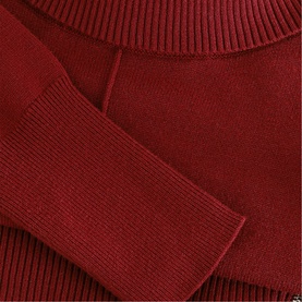 Phase Eight women's knit top in orange, close-up of ribbed cuff and neckline detail