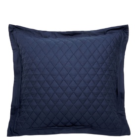 Navy blue quilted cushion with diamond stitch pattern and contrast border, photographed on white background