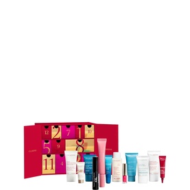 Clarins 12 Day Advent Calendar Gift Set with pink numbered doors and 12 miniature skincare and beauty products displayed alongside