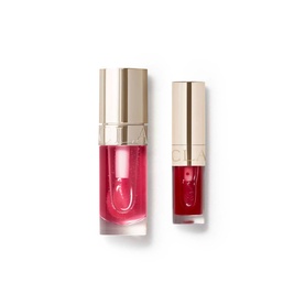 Clarins Lip Comfort Oil Gift Set featuring two lip oils in pink and deep red shades with gold caps, presented on a white background