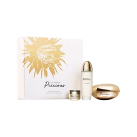 Clarins Precious Exceptional Skincare Gift Set with serum, cream, and mini pot in gold and white gift box