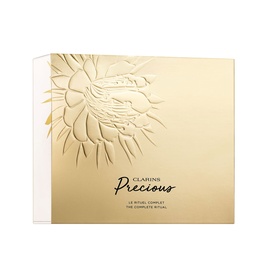 Clarins Precious Complete Ritual Gift Set in gold embossed box with decorative floral relief design