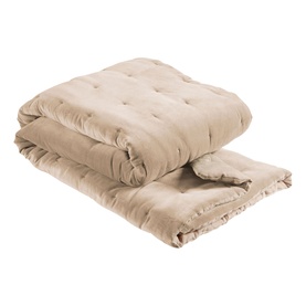 Folded beige tufted velvet quilted bedspread with plush texture and padded sections