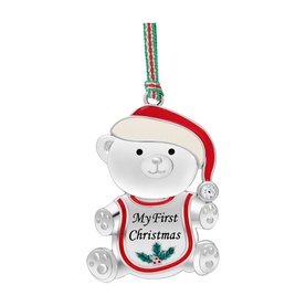 Newbridge silver My First Christmas bear ornament with red Santa hat, holly detail, and striped ribbon hanger