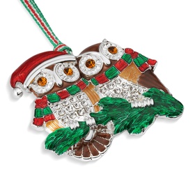 Newbridge silver owl couple Christmas ornament with crystal embellishments, red and green enamel festive details, on striped ribbon hanger
