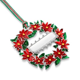 Newbridge silver-tone Christmas wreath ornament with red enamel poinsettias, green leaves, and red and green ribbon hanger