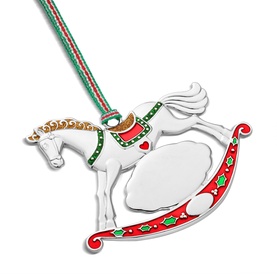 Newbridge silver rocking horse Christmas tree ornament with red, green and gold enamel detail and striped ribbon hanger