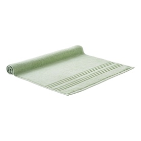 Christys green bath towelling mat, partially rolled, with woven stripe detail along the edges