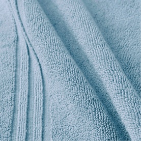 Christys Bath Towelling in Faded Denim, close-up of soft looped cotton terry texture with ribbed border detail.