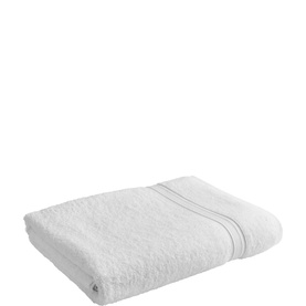 Christys white bath towel, folded flat, with subtle grey stripe border detail along one edge