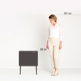 Brabantia Lilac Pink kitchen bin shown beside a 167cm model for scale, reaching 68cm in height