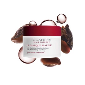 Clarins Le Masque Baume Hair Mask pot surrounded by shea butter and ceramide ingredients on white background