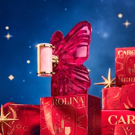 Carolina Herrera La Bomba Eau de Parfum & Travel Spray Gift Set 50ml, deep red butterfly-shaped bottle with gold cap, red gift boxes