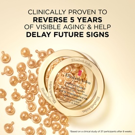 Elizabeth Arden Advanced Gold Ceramide Capsules Daily Youth Restoring Serum, 60 gold capsules in open circular jar with scattered capsules