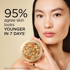 Model with Elizabeth Arden Advanced Gold Ceramide Capsules Daily Youth Restoring Serum, 60 Capsules, gold compact jar