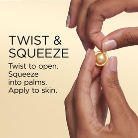 Elizabeth Arden Advanced Gold Ceramide Capsule being twisted open between two fingers, with instructions: Twist, Squeeze into palms, Apply to skin.