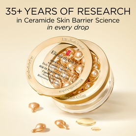 Elizabeth Arden Advanced Gold Ceramide Capsules Daily Youth Restoring Serum, open jar of 60 gold capsules with loose capsules beside it