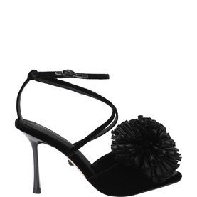 Kurt Geiger London black suede heeled sandal with oversized fringed flower detail and ankle-wrap strap, stiletto heel