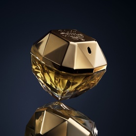 Paco Rabanne Lady Million Eau de Parfum Gift Set 50ml, faceted gold geometric bottle with reflective dark background