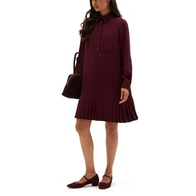 Model wearing Hobbs fig purple long-sleeve shirt dress with pleated hem, styled with matching heels and small dark handbag