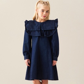 Model wearing Angel & Rocket Denim Blue cotton dress with large frill collar and long balloon sleeves, A-line silhouette