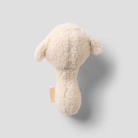 Lil Atelier turtledove plush toy rattle, curly cream fleece lamb design with small tag, rear view