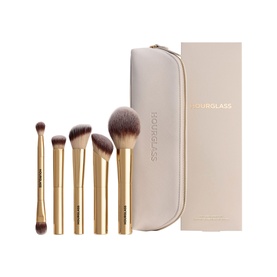 Hourglass make-up brush set with 6 gold-handled brushes and cream zip pouch with gold logo detail