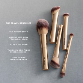 Hourglass The Travel Brush Set featuring five gold-handled brushes: Veil Powder, Foundation, Blush, Concealer and Eyeshadow