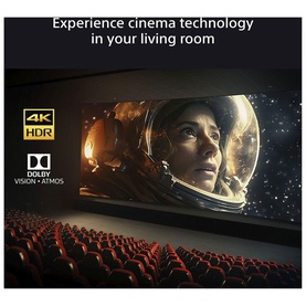 Large screen TV displaying 4K HDR sci-fi film with Dolby Vision and Atmos logos, cinema-style seating in foreground