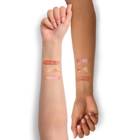 Charlotte Tilbury Beauty All Make Up Set lip gloss shades swatched on two arms showing range across fair and deep skin tones