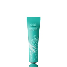 Dr.Jart+ teal hand cream tube with embossed hand graphic, screw cap, on white background