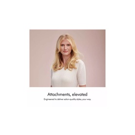 Model with Dyson Airwrap&trade; Origin Multi-Styler & Dryer results showing voluminous, styled blonde hair with a soft wave finish