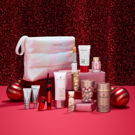 Elizabeth Arden Beauty All Skincare Set with iridescent white pouch, featuring assorted skincare, capsules
