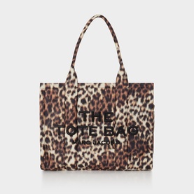 Marc Jacobs The Tote Bag in brown multi leopard print canvas, black logo lettering, short twin handles, no visible hardware
