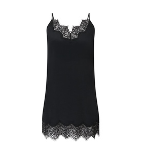 Vera Wang Sibel Lace Trim Dress in black with scalloped black lace trim at V-neckline and hem, thin straps, mini slip silhouette