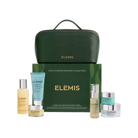 Elemis The Ultimate Getaway Collection Gift Set with green travel bag, skincare bottles, cream jars and boxed presentation set