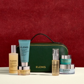 Elemis The Ultimate Getaway Collection Gift Set with green travel bag, cleanser, serum, moisturiser and body oil